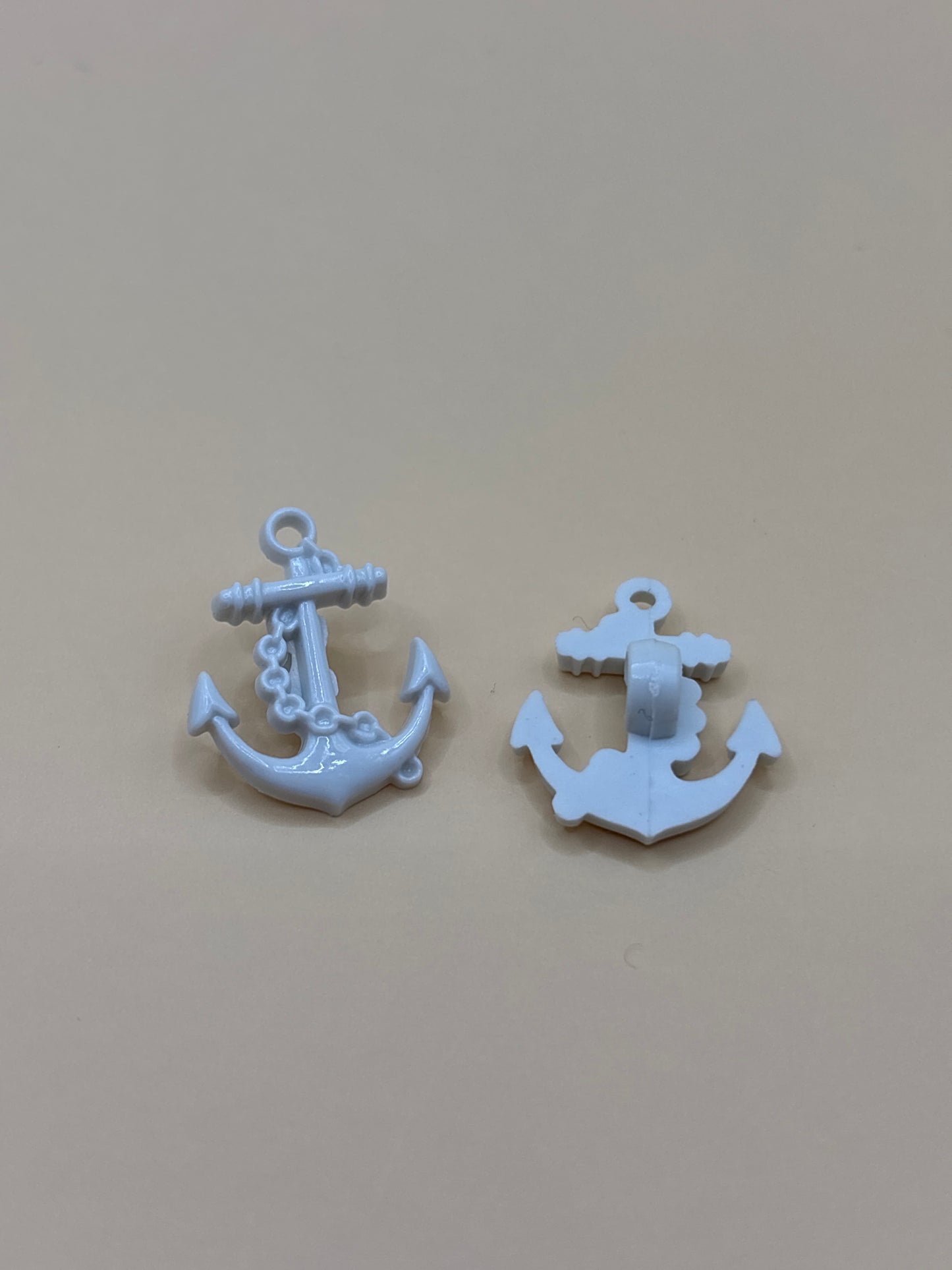 Anchor shaped button