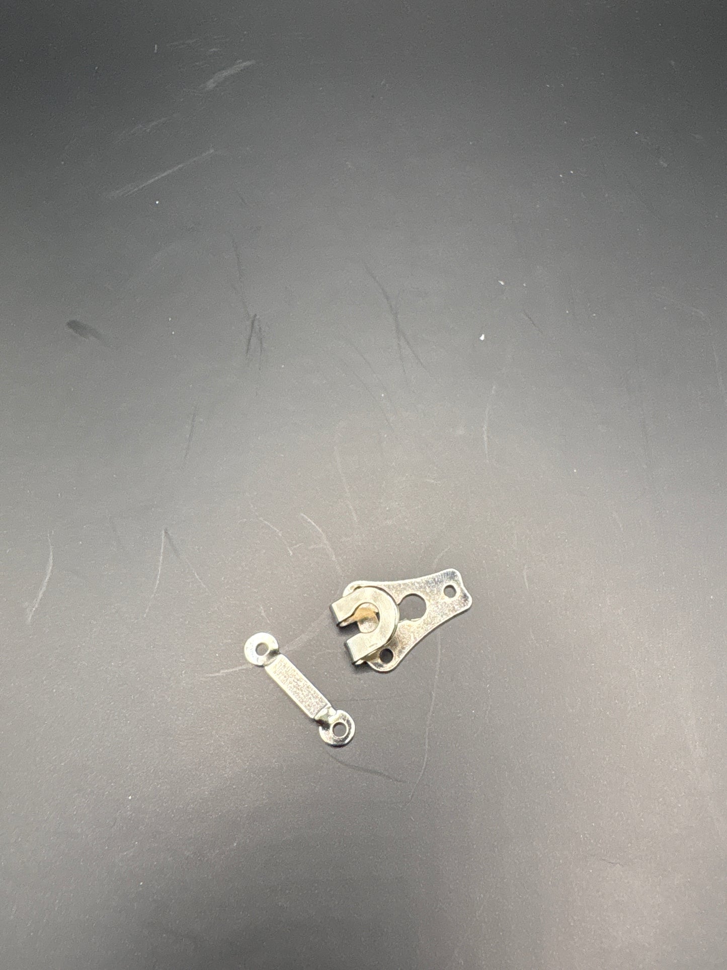 Metal trouser hook and bar