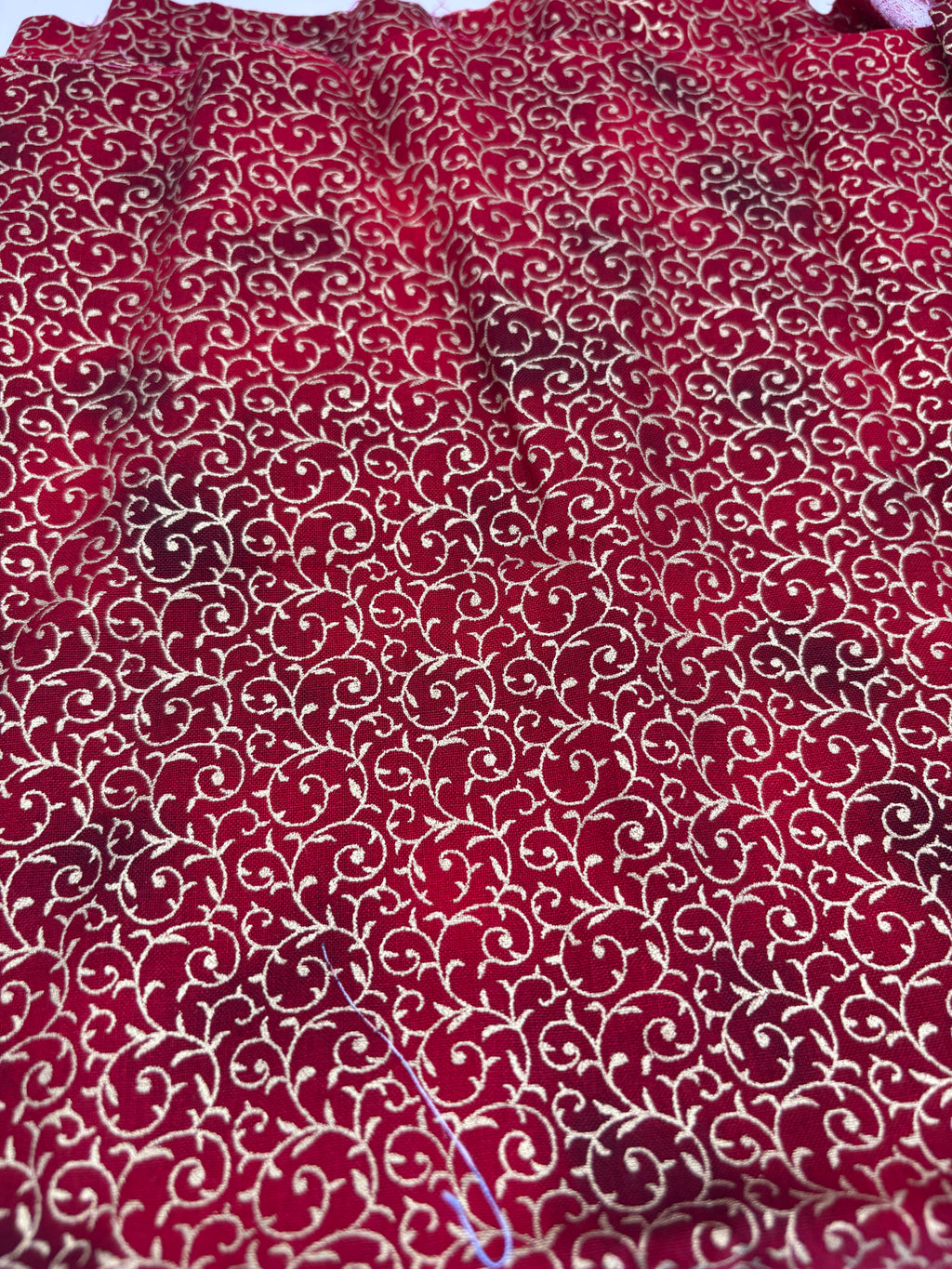 John Louden Christmas prints red and gold swirls