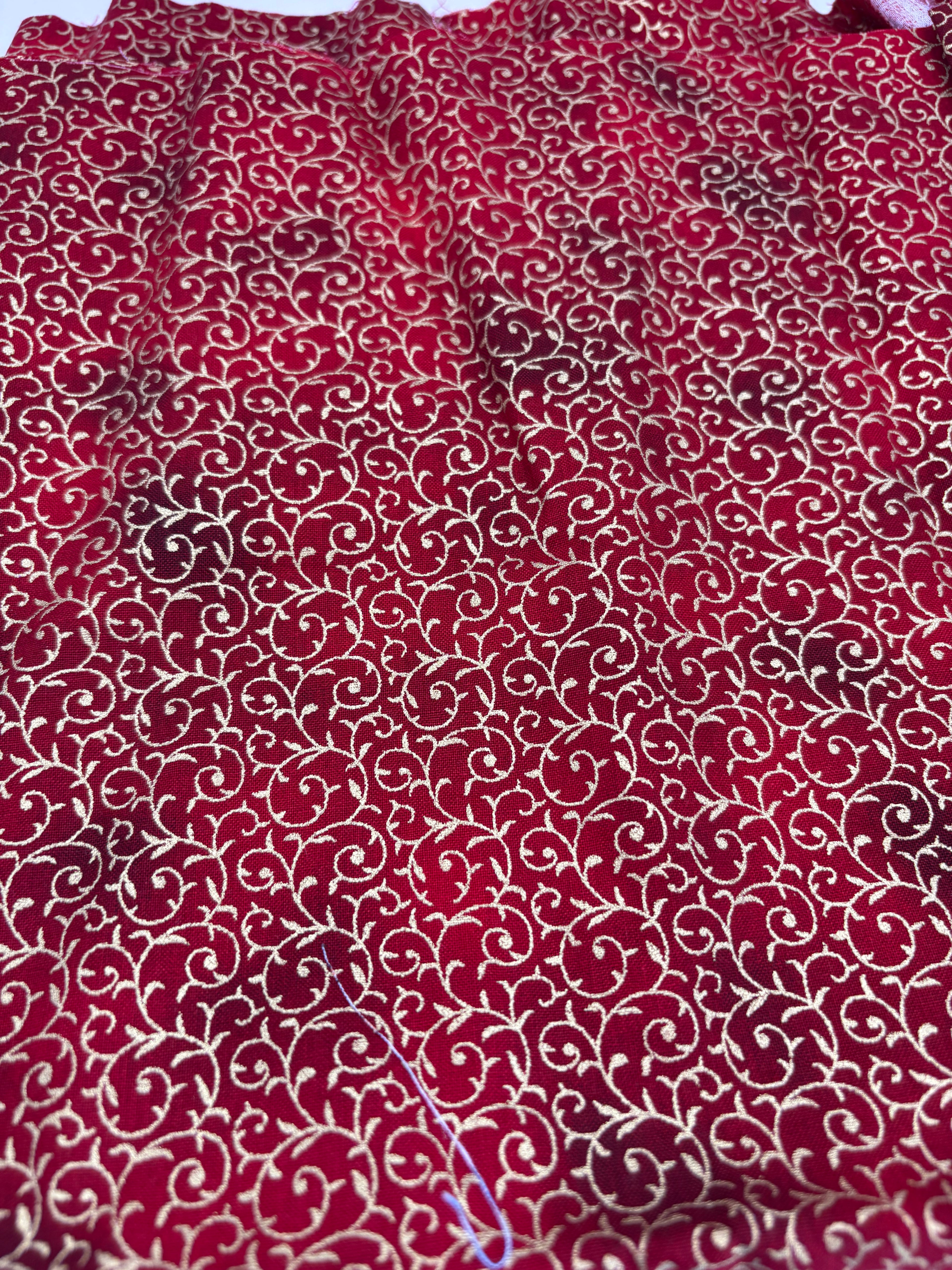 John Louden Christmas prints red and gold swirls