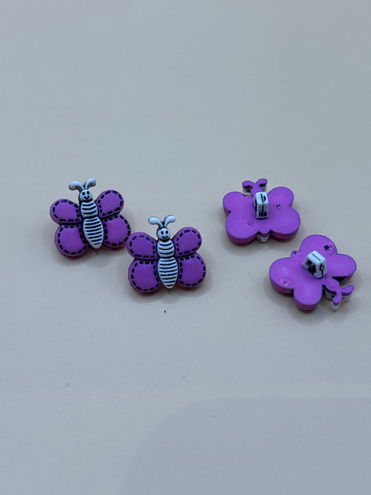Purple butterfly shaped buttons