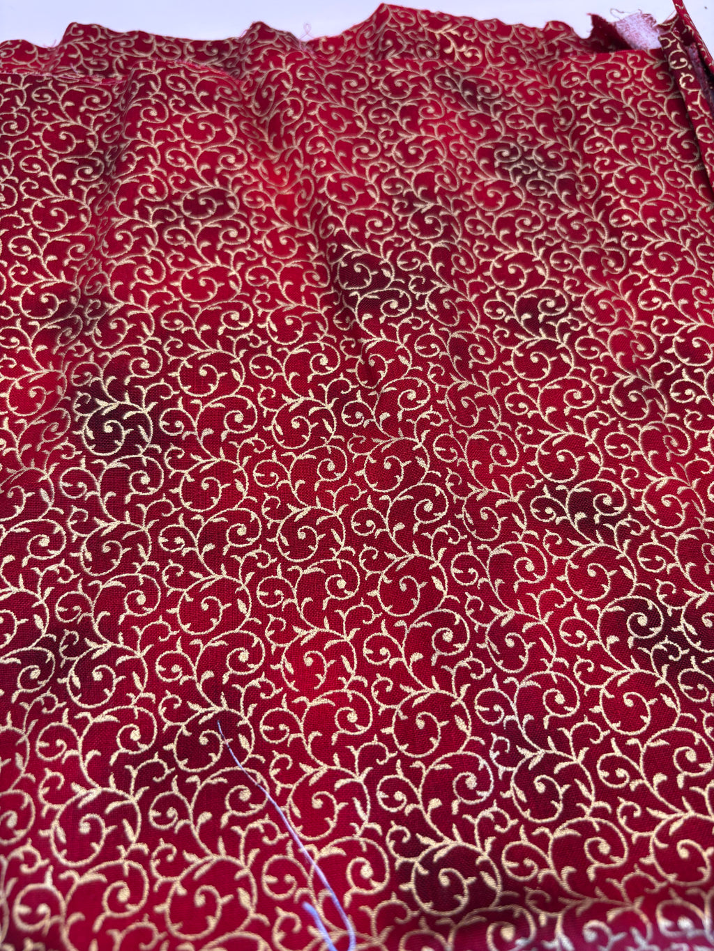 John Louden Christmas prints red and gold swirls