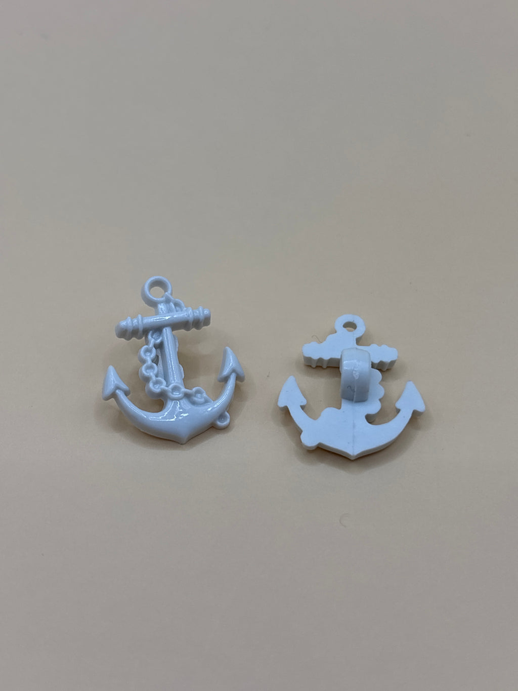 Anchor shaped button