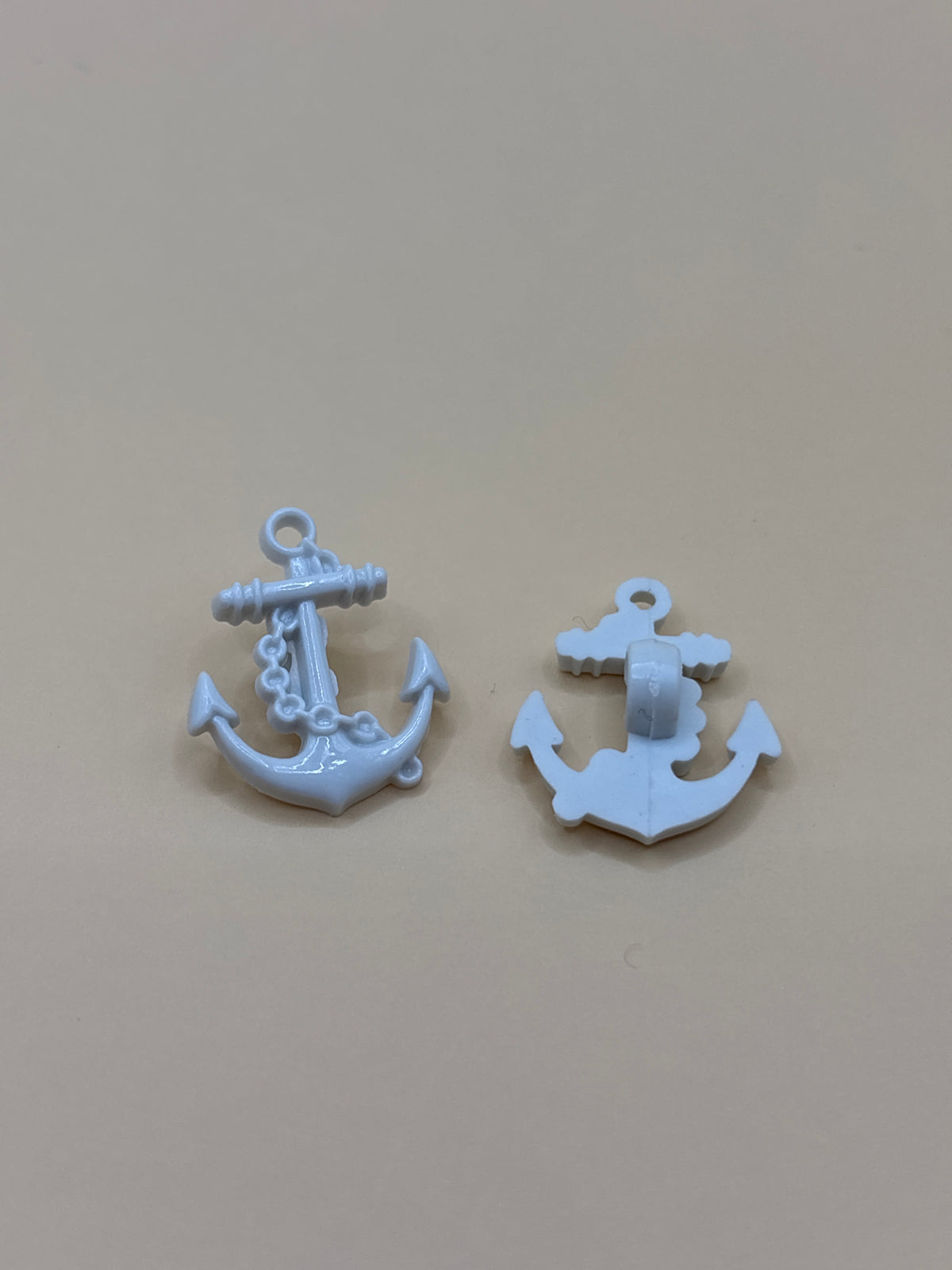 Anchor shaped button