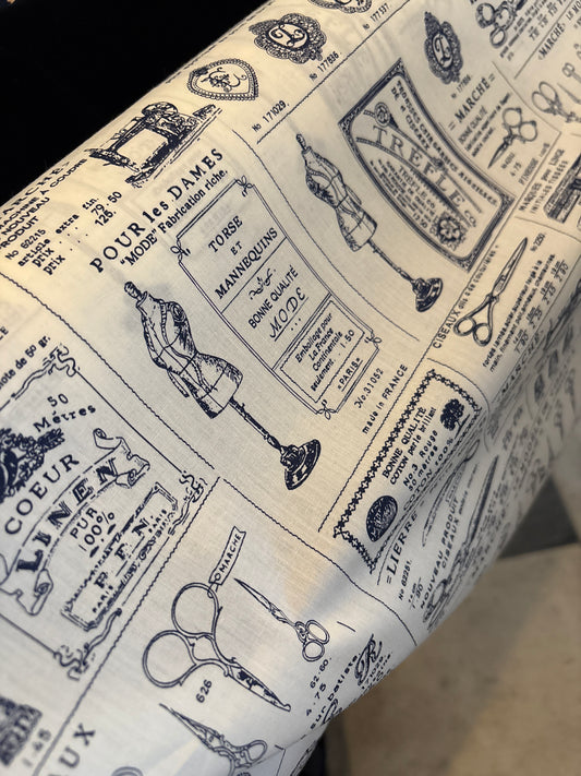 Ivory sewing advertising fabric