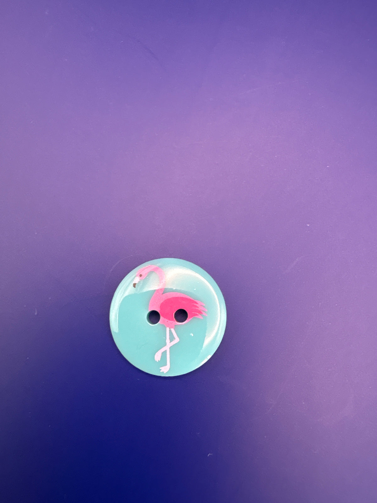 Flamingo button