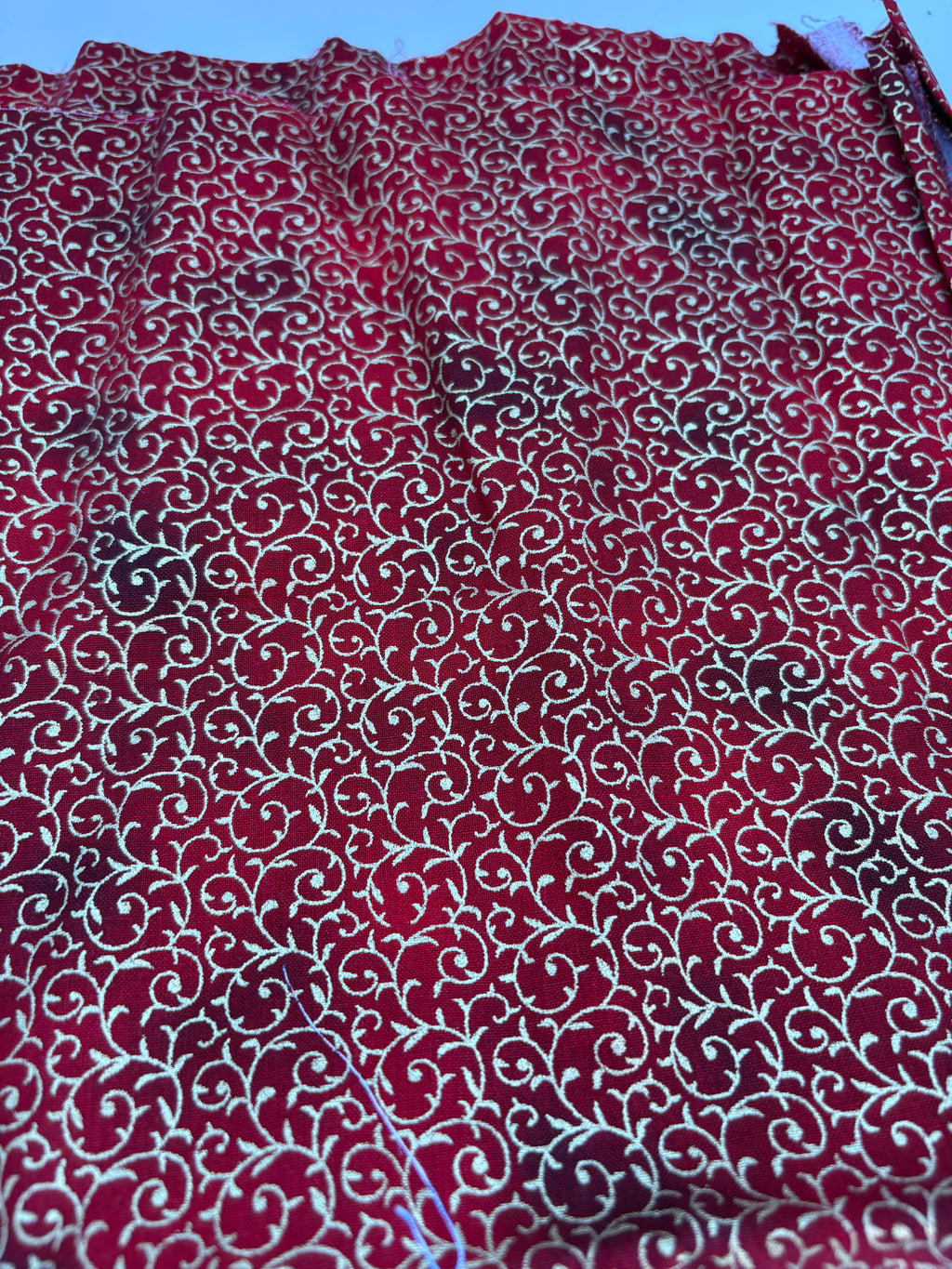 John Louden Christmas prints red and gold swirls