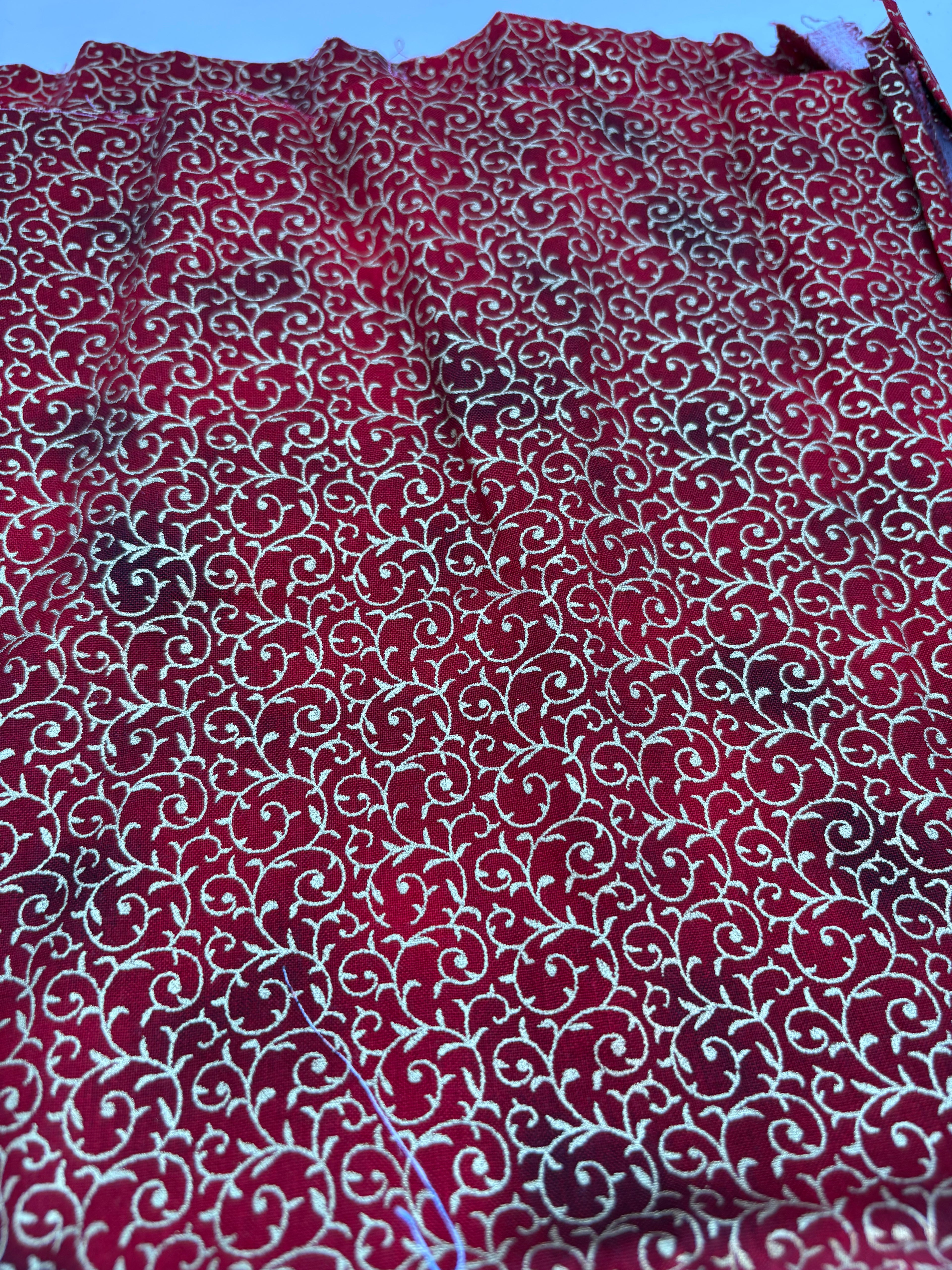 John Louden Christmas prints red and gold swirls