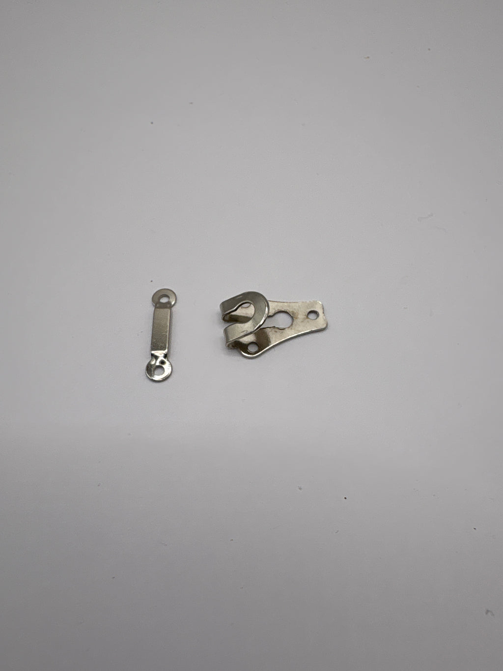 Metal trouser hook and bar