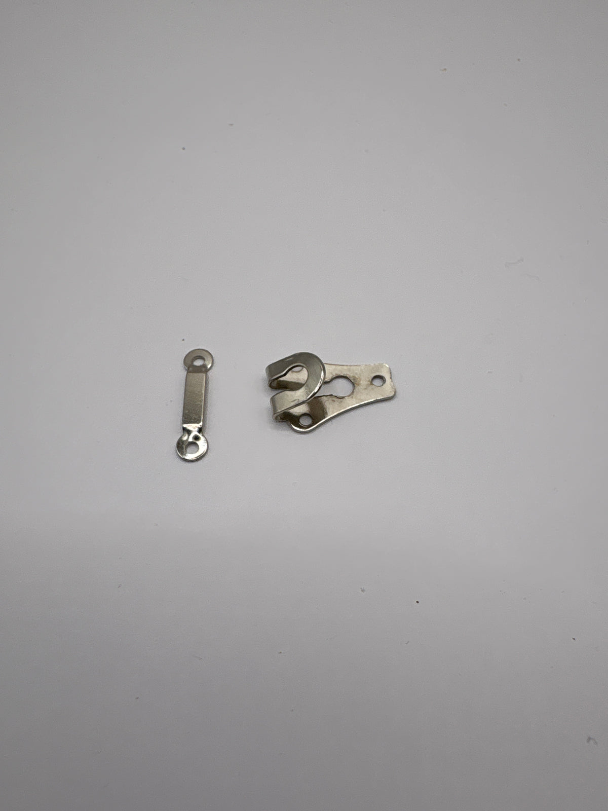 Metal trouser hook and bar