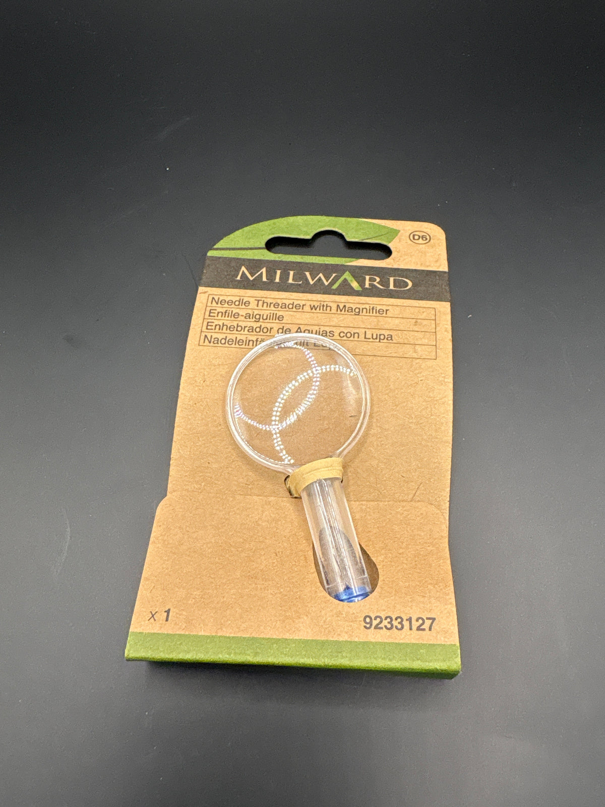Needle threader with magnifier