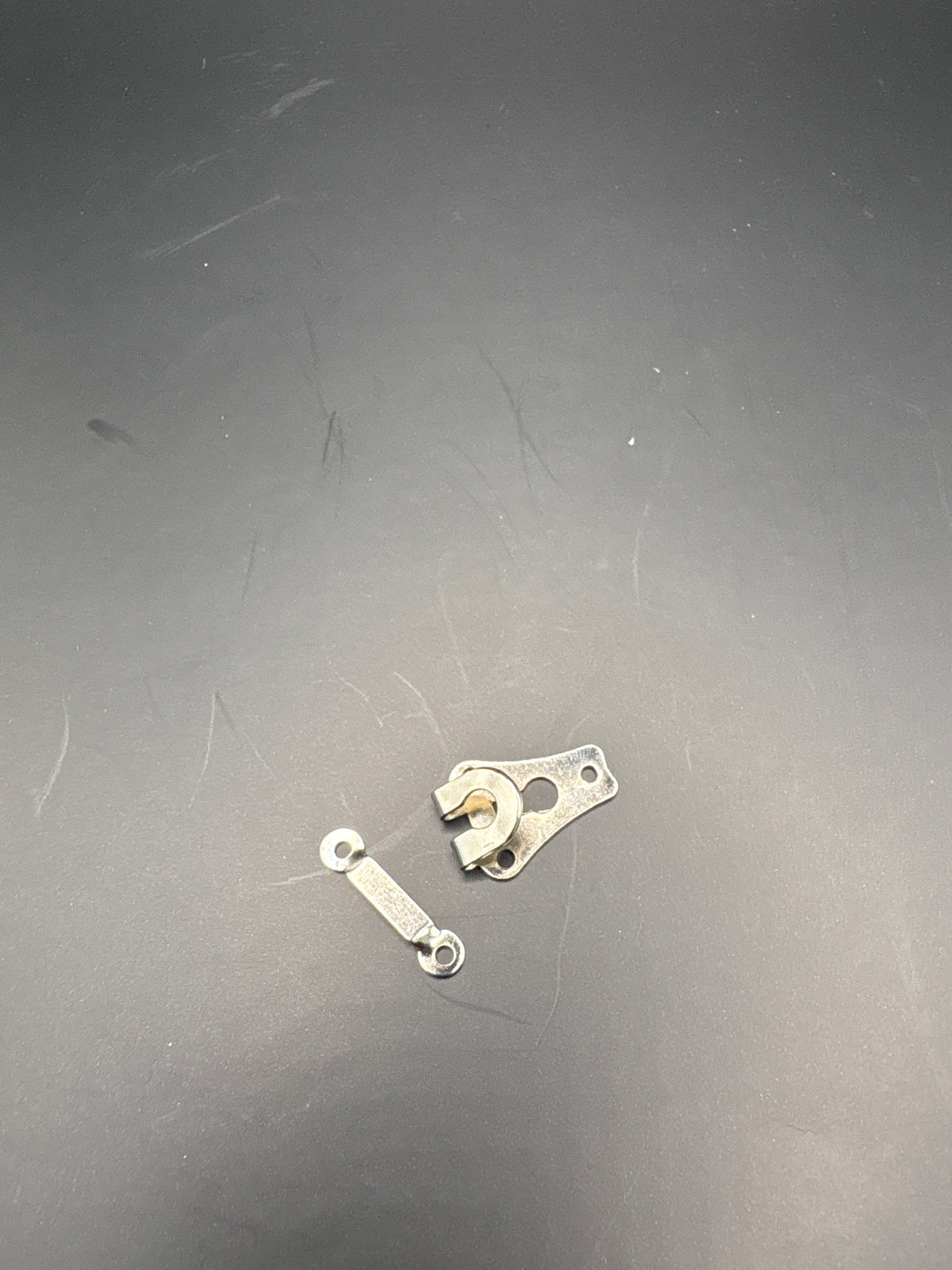 Metal trouser hook and bar